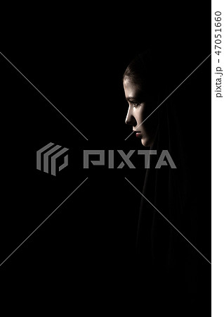 nun in dark 47051660