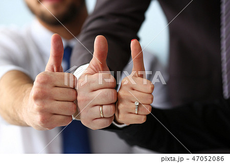 Group of people show OK or confirm with thumb up Group of people show OK or confirm with thumb up 47052086