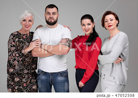 Three-quarter portrait of a group of young people isolated on a light background Three-quarter portrait of a group of young people isolated on a light background 47052508