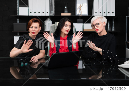 Team work on project of three business women Team work on project of three business women 47052509