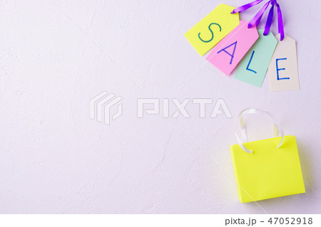 sale banner with shopping bag and price tags sale banner with shopping bag and price tags 47052918