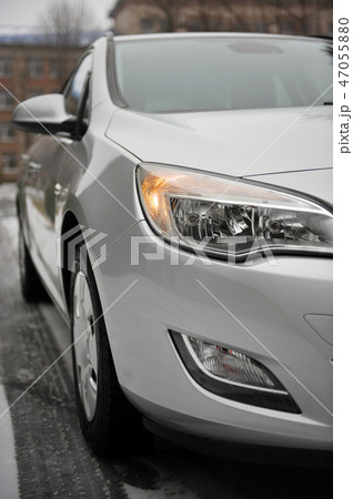 headlight of the main light of the white car, close-up. headlight of the main light of the white car, close-up. 47055880