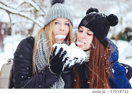 Creative funny and happy two beautiful girlfriends Creative funny and happy two beautiful girlfriends 47058732