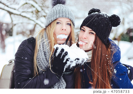 Creative funny and happy two beautiful girlfriends Creative funny and happy two beautiful girlfriends 47058733