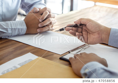 Insurance or loan real estate, Agent broker and client signing c 47058856