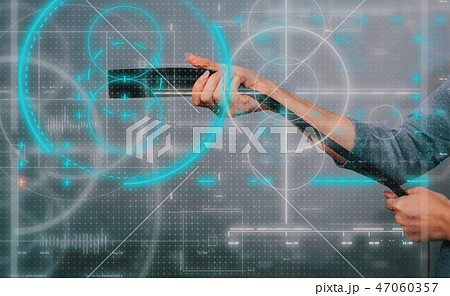 Young woman with an electric vehicle charger Young woman with an electric vehicle charger 47060357