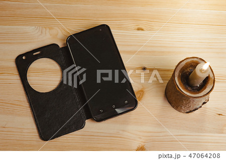 candle on the table 47064208