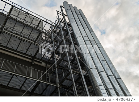 Building with pipes and stairs. 47064277