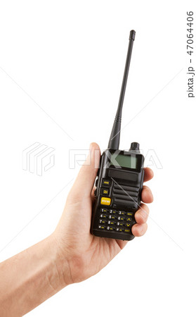 Portable radio transceiver in hand 47064406