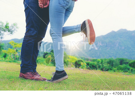 Happy couple take a romantic walk on the hills. Happy couple take a romantic walk on the hills. 47065138