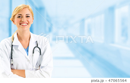Woman doctor working at the hospital office. 47065564