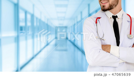 Young male doctor working at the hospital. 47065639