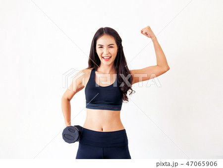 Sporty woman workout with dumbbell. Sporty woman workout with dumbbell. 47065906