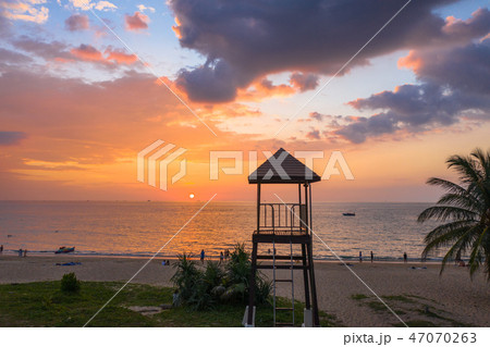 sunset above guard tower at Karon beach Phuket 47070263