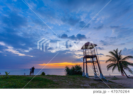 sunset above guard tower at Karon beach Phuket 47070264