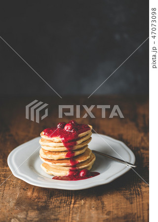 Pancakes with cranberry sauce Pancakes with cranberry sauce 47073098