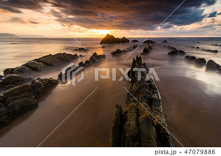 flysch rocks in barrika beach at the sunset 47079886