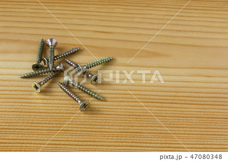 Close-up on screws, metal screws, iron screws Close-up on screws, metal screws, iron screws 47080348