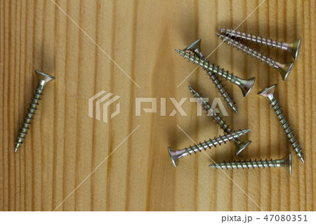 Close-up on screws, metal screws, iron screws 47080351