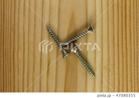 Close-up on screws, metal screws, iron screws Close-up on screws, metal screws, iron screws 47080355