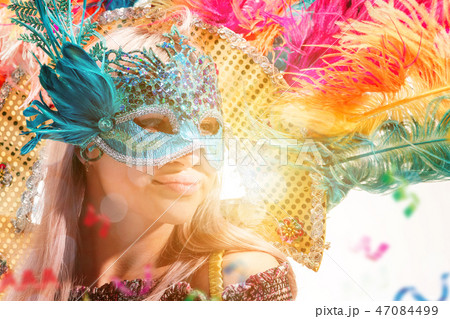 Beautiful young woman in carnival mask Beautiful young woman in carnival mask 47084499