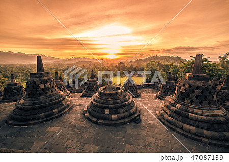 Dramatic sunset Borobudur Temple at sunset Yogyakarta, Java, Indonesia. 47087139