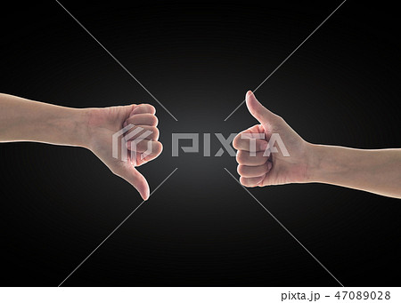 Like - unlike hand with thumb up - down symbolic Like - unlike hand with thumb up - down symbolic 47089028