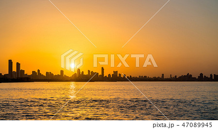 Skyline of Kuwait City at sunset. 47089945
