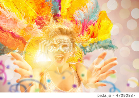 Beautiful young woman in carnival mask 47090837