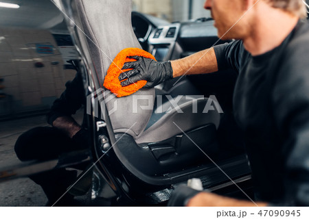 Chemical cleaning of car seats using special agent 47090945