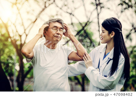 Friendly doctor taking care of senior man. 47098402