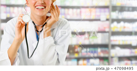 Woman pharmacist working at pharmacy. 47098495