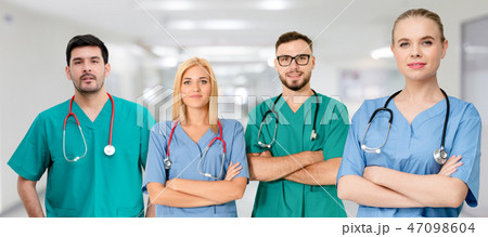 Doctor working in hospital with other doctors. Doctor working in hospital with other doctors. 47098604