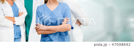 Doctor working in hospital with other doctors. Doctor working in hospital with other doctors. 47098692