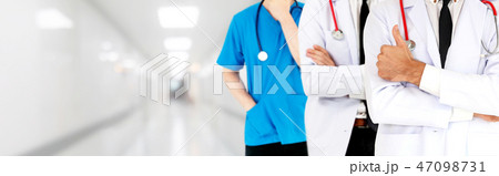 Doctor working in hospital with other doctors. 47098731
