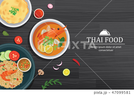 Tom yum kung in the bowl on black wood table top  47099581