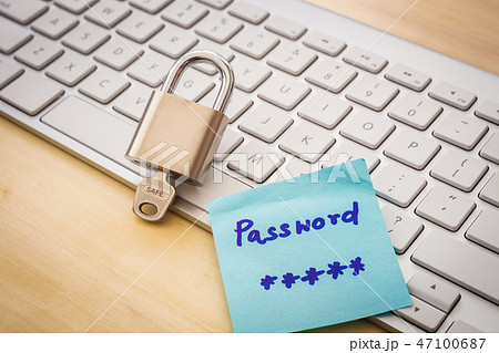 Padlock with SAFE word on key, keyboard background 47100687