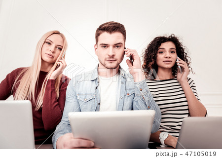 Nice smart people making calls Nice smart people making calls 47105019