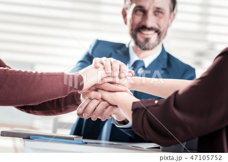 Female and male hands holding together Female and male hands holding together 47105752