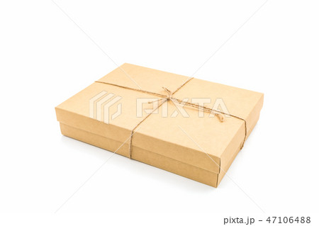 Brown paper box, tied with string. 47106488