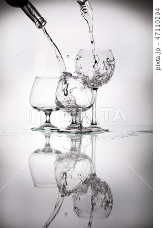 glasses and bottles for brandy and wine in the background glasses and bottles for brandy and wine in the background 47110294