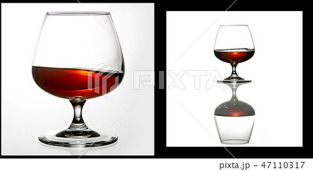 glasses and bottles for brandy and wine in the background 47110317