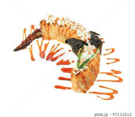 Sushi rolls in the shape of a dragon. 47112312