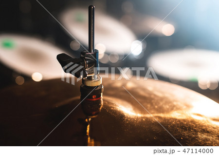 Close-up Drum set in a dark room against the backdrop of the spotlight. Atmospheric background Close-up Drum set in a dark room against the backdrop of the spotlight. Atmospheric background 47114000