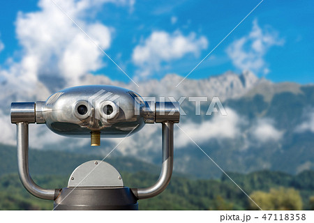 Coin operated binoculars on a mountain landscape 47118358