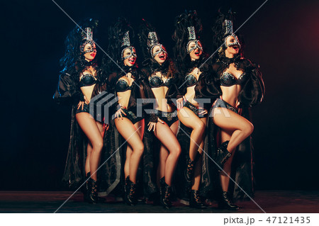 young beautiful dancers posing on studio background young beautiful dancers posing on studio background 47121435