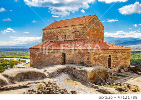 Beautuful View to Ancient Orthodox historic Church in antique cave city Uplistsikhe. The Uplistsikhe 47121788