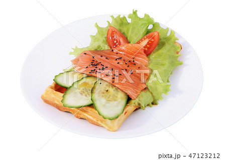 Belgian waffle with sliced salted salmon, tomatoes 47123212