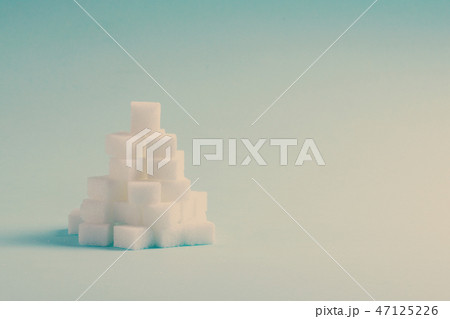 Sugar on blue background 47125226