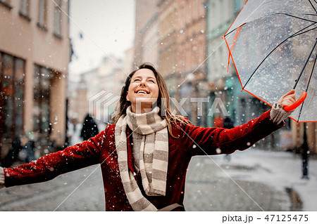 girl with umbrella white snow falling stay on city street girl with umbrella white snow falling stay on city street 47125475